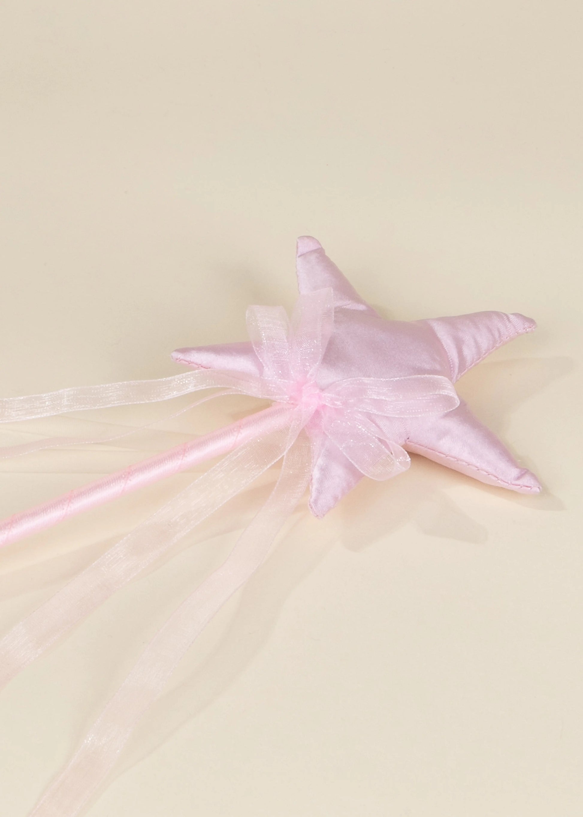 Baguette magique étoile rose avec ruban 