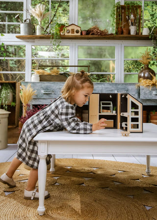 Maison de poupée en bois à emporter