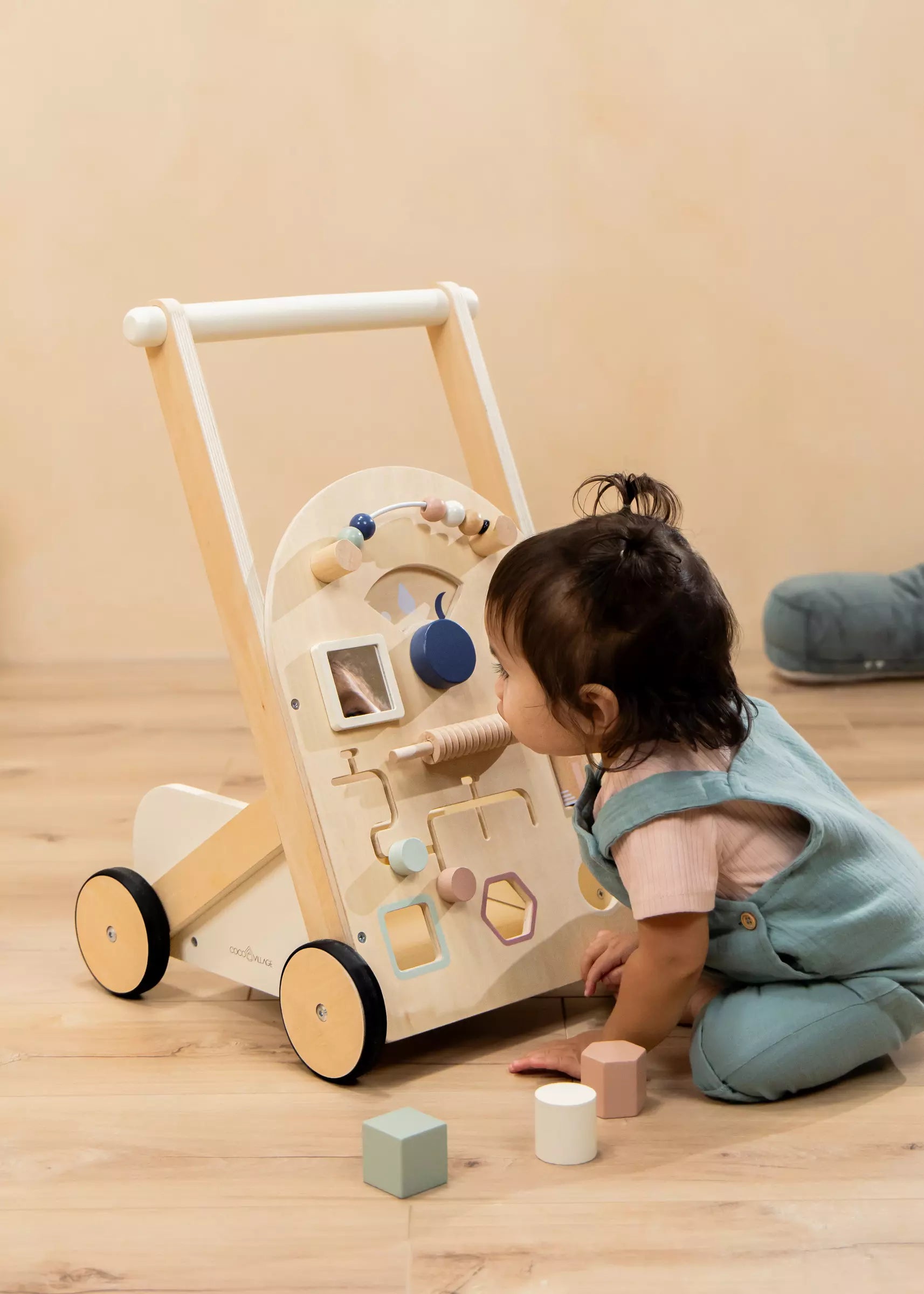 Wooden activity walker for top baby